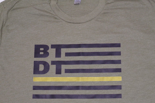 Our "Thin yellow line" flag logo on an olive green T-shirt. The best way for non-veterans to let us know they support all veterans and are here for us if we need anybody to talk to!