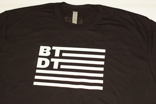 Black men's T-shirt with our flag logo across the entire chest. Let others know you've been there, done that!